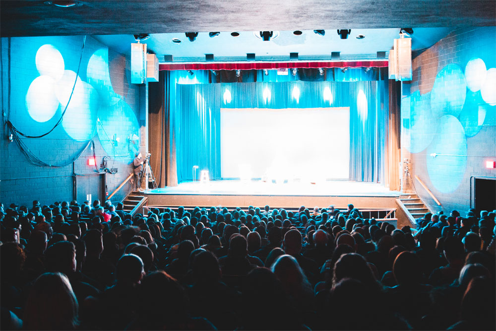 people sitting on theater c
